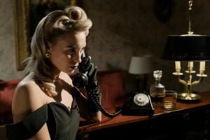 photo of woman in black off shoulder dress